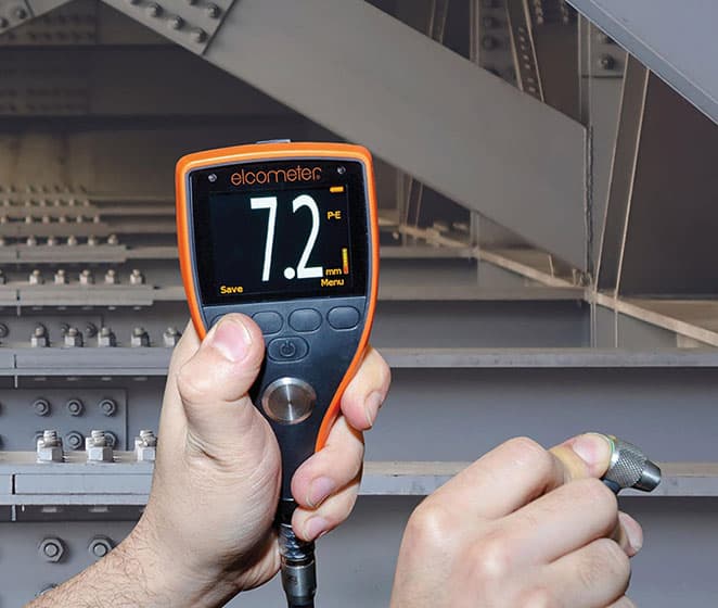 Ultrasonic thickness gauge in use